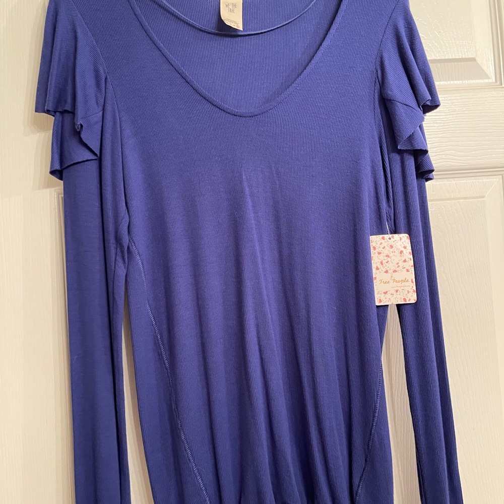 Wow look at this Free People long sleeve purple shirt. Great buy!